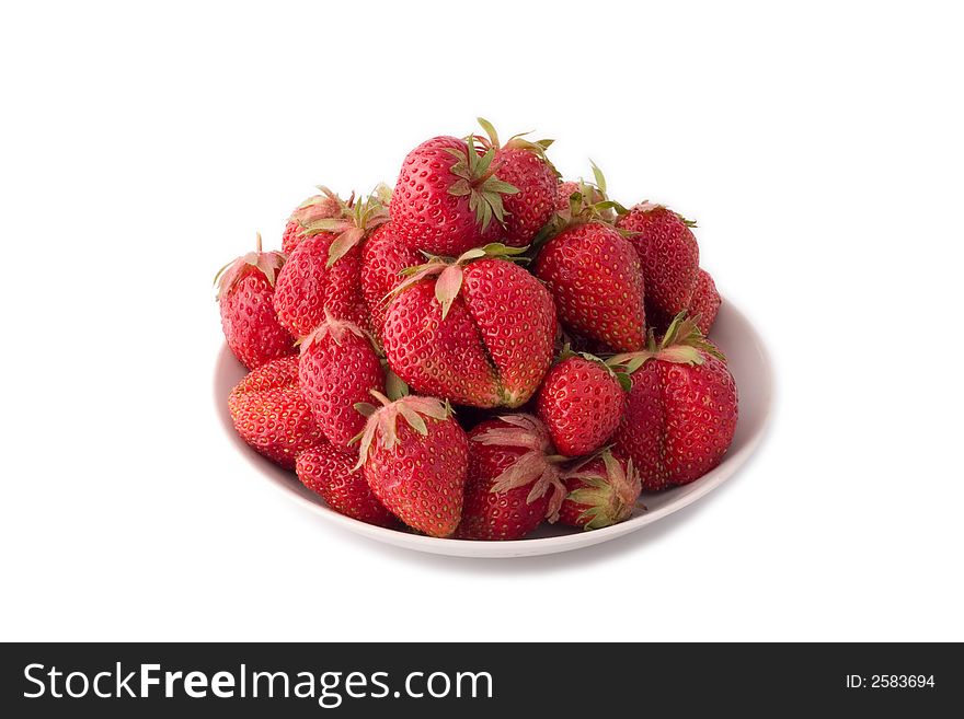 Plate with strawberries isolated on white with shadows