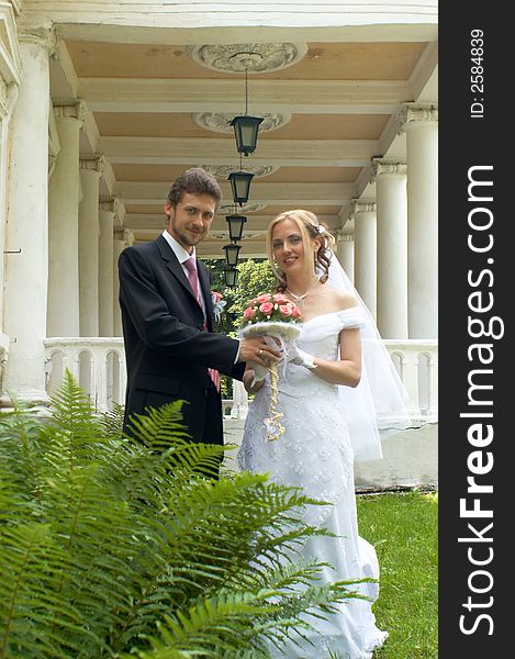 An image of a young couple during their wedding. An image of a young couple during their wedding