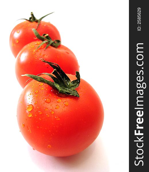 Three tomatos over white background, isolated