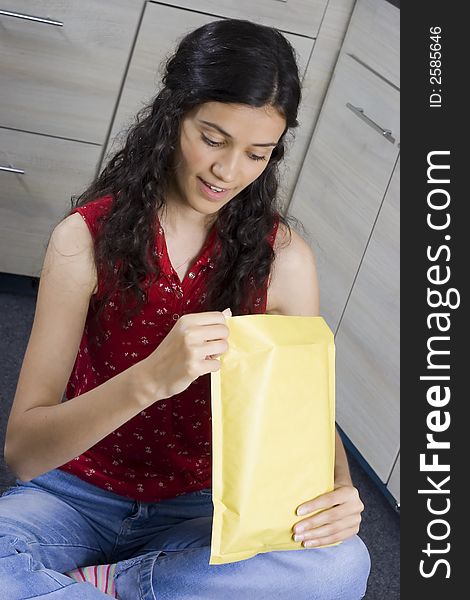 Girl with envelope in her hands. Girl with envelope in her hands