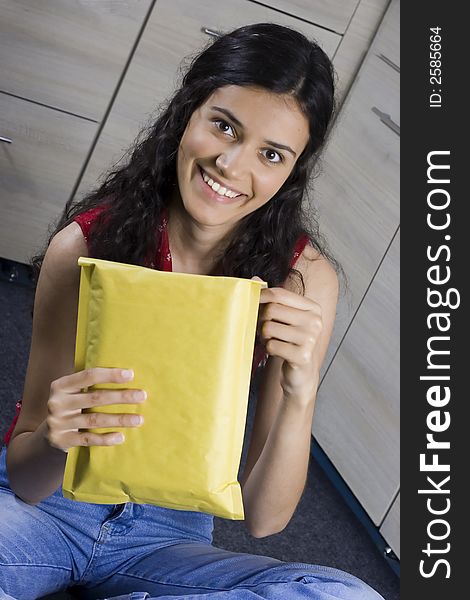 Girl with envelope in her hands. Girl with envelope in her hands