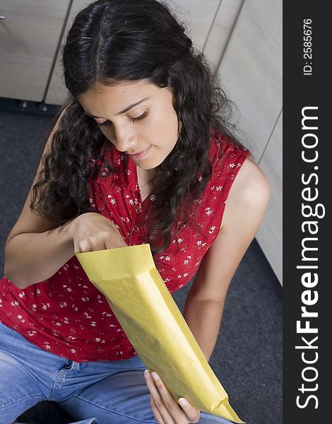 Girl with envelope in her hands. Girl with envelope in her hands