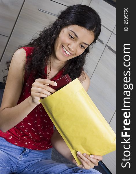 Girl with envelope in her hands. Girl with envelope in her hands