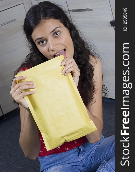 Girl with envelope in her hands. Girl with envelope in her hands