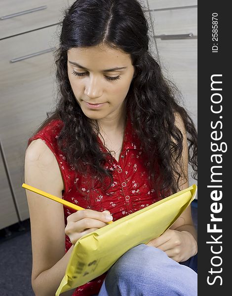 Girl with envelope in her hands. Girl with envelope in her hands