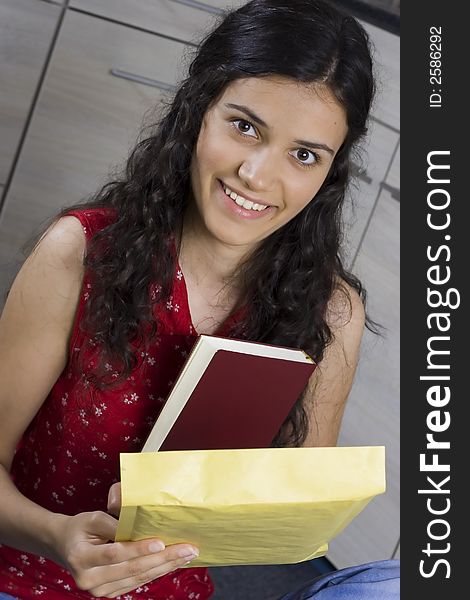 Girl with envelope in her hands. Girl with envelope in her hands