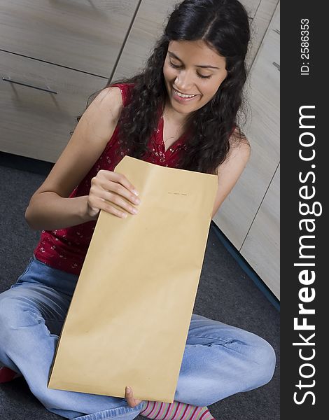 Girl with envelope in her hands. Girl with envelope in her hands