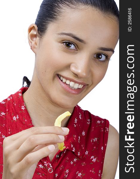 Smiling girl in red eating potatoes. Smiling girl in red eating potatoes