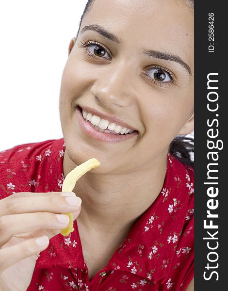 Smiling girl in red eating potato. Smiling girl in red eating potato