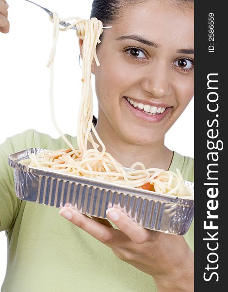 Smiling girl holding plate with spaghetti. Smiling girl holding plate with spaghetti