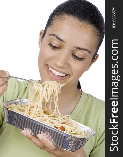 Smiling girl holding plate with spaghetti. Smiling girl holding plate with spaghetti