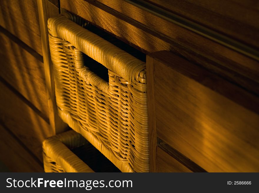 Detail of wooden furniture with drawers