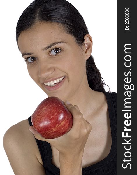 Smiling girl holding apple in her hand. Smiling girl holding apple in her hand