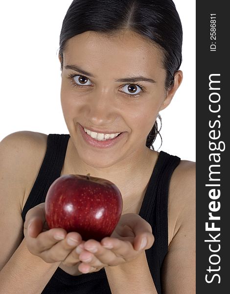 Smiling girl holding apple in her hands. Smiling girl holding apple in her hands