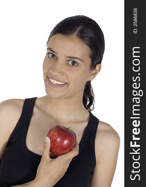 Smiling girl holding apple in her hand. Smiling girl holding apple in her hand