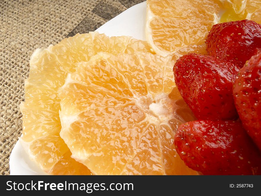 Fresh fruits salad close up. Fresh fruits salad close up