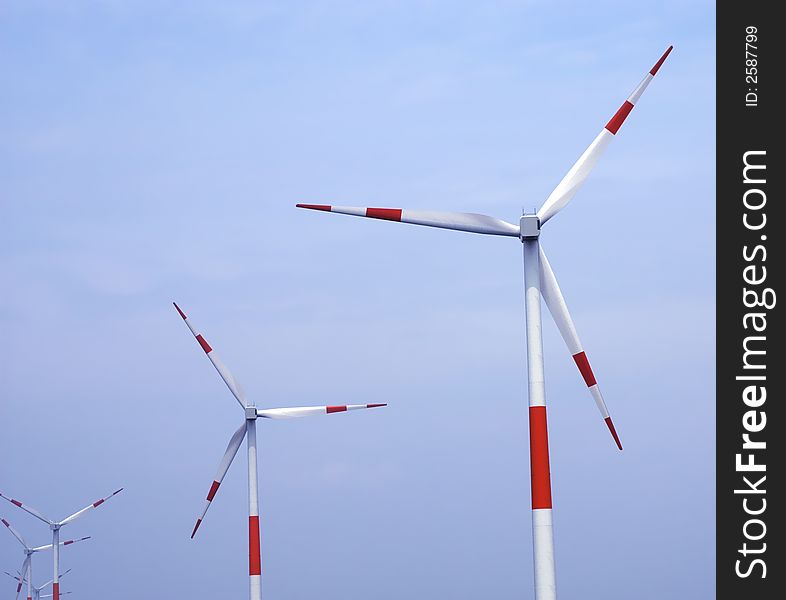 Wind turbines with cloudy background