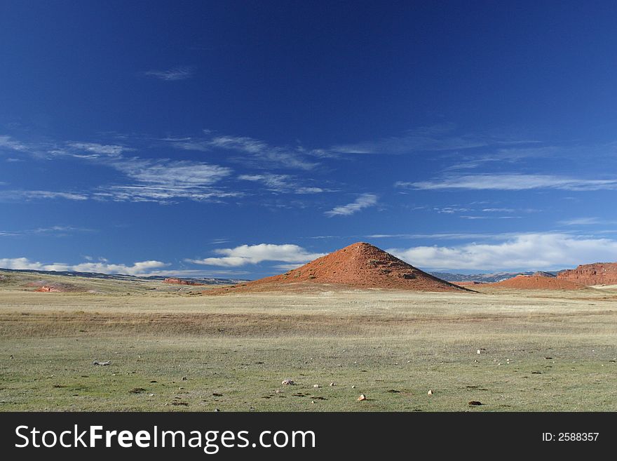 A red cone in the desert of central Wyoming. A red cone in the desert of central Wyoming.