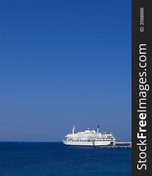 Ferryboat at the harbor in the city of Rhodes