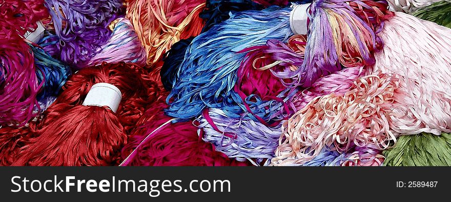 Panaromic image of colorful silk ribbons. Panaromic image of colorful silk ribbons