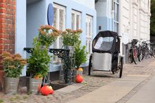 Tricycle And House Royalty Free Stock Photos