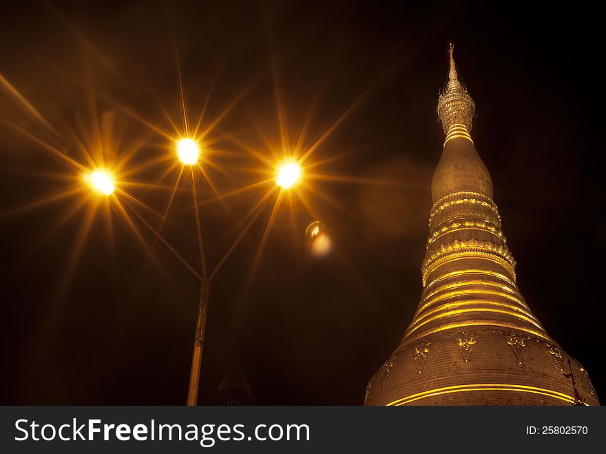 Top part of the Shwedagon pagoda during night time