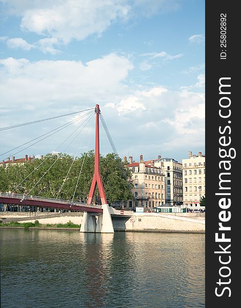 Footbridge Palais de Justice, Saone river, a view from Romain Rolland quay, Lyon, France. Footbridge Palais de Justice, Saone river, a view from Romain Rolland quay, Lyon, France