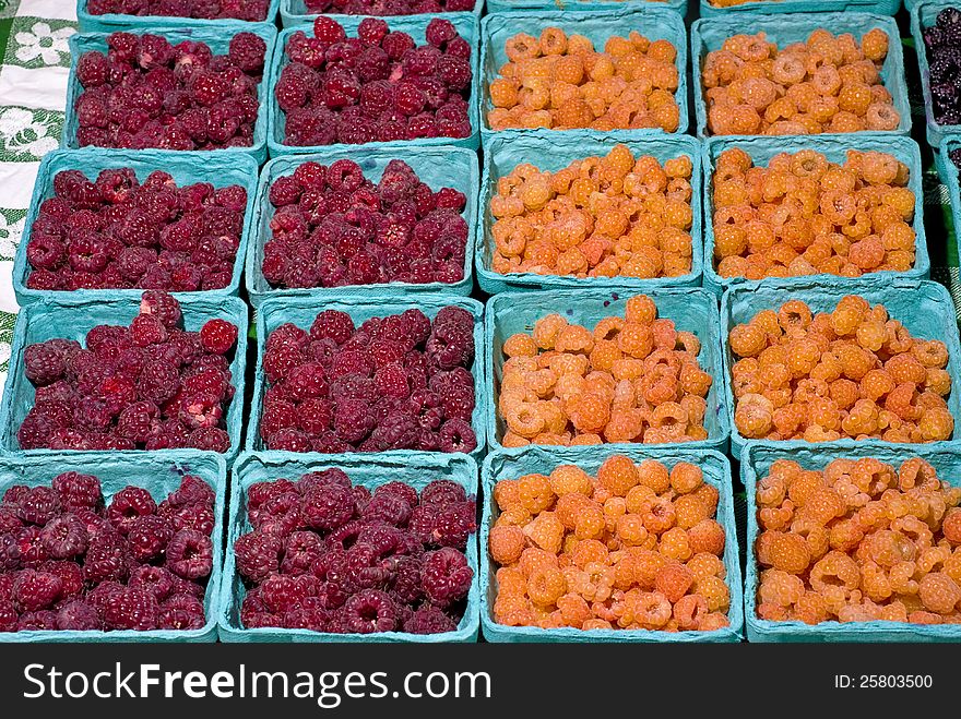 Red And Yellow Raspberries On Display For Sale
