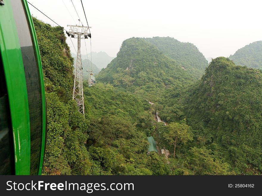 Amazing view of green and lush hills from a cable car in Vietnam. Amazing view of green and lush hills from a cable car in Vietnam.
