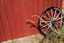 Old Wagon Wheel Red Wall Royalty Free Stock Image Old Wagon Wheel Red Wall Royalty Free Stock Image