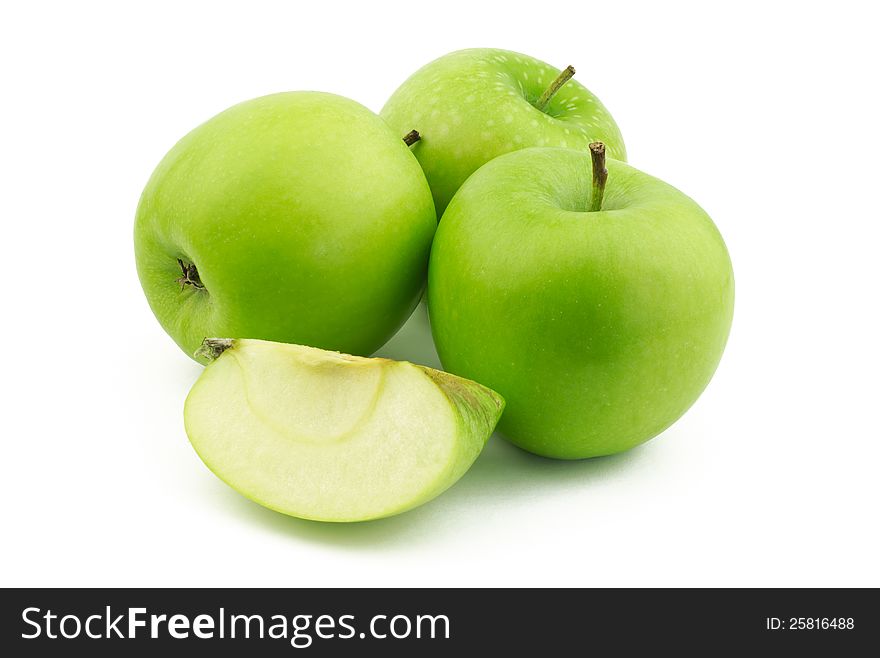 Three green apples and one quarter on white background. Three green apples and one quarter on white background