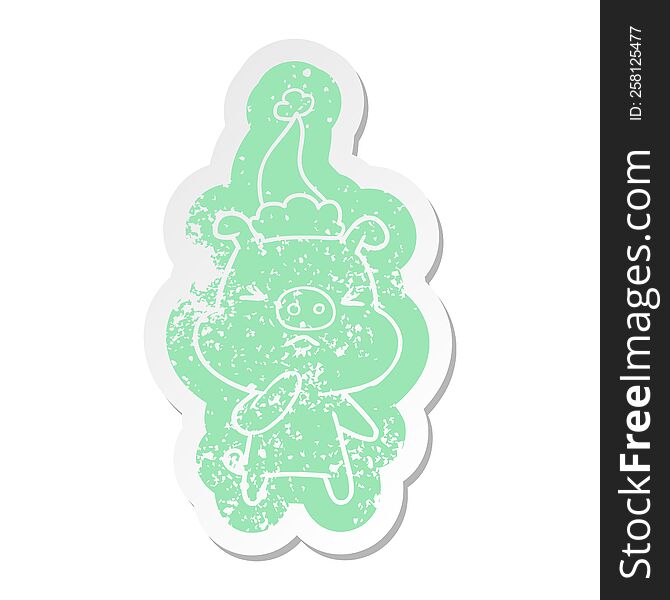 Cartoon Distressed Sticker Of A Angry Pig Wearing Santa Hat