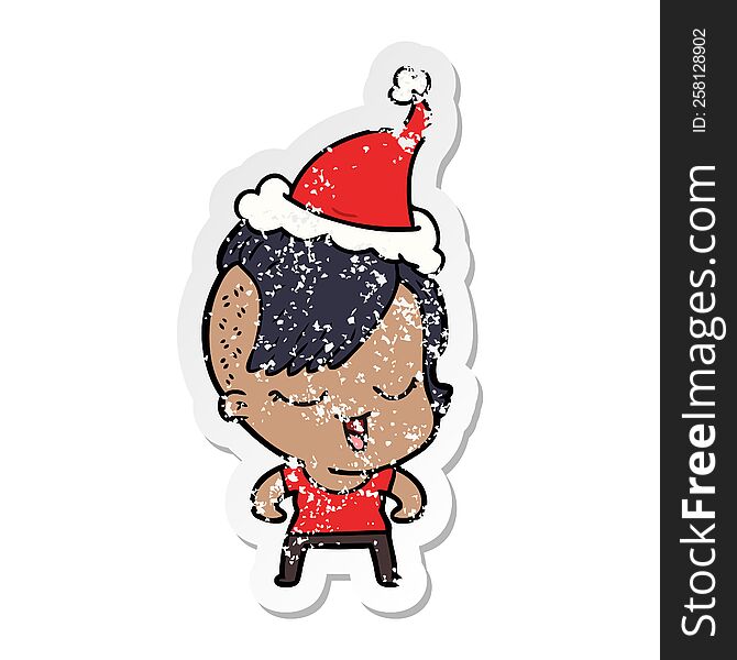 Happy Distressed Sticker Cartoon Of A Girl Wearing Santa Hat
