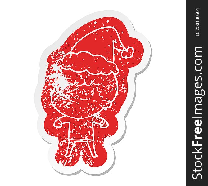 quirky cartoon distressed sticker of a curious boy wearing santa hat