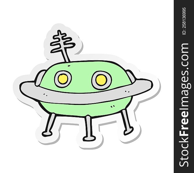 sticker of a cartoon alien spaceship