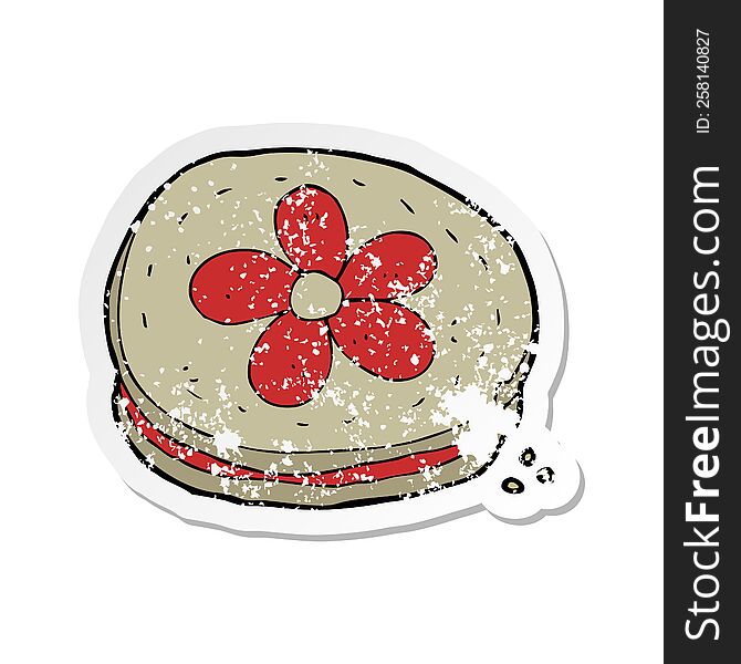 Retro Distressed Sticker Of A Cartoon Biscuit