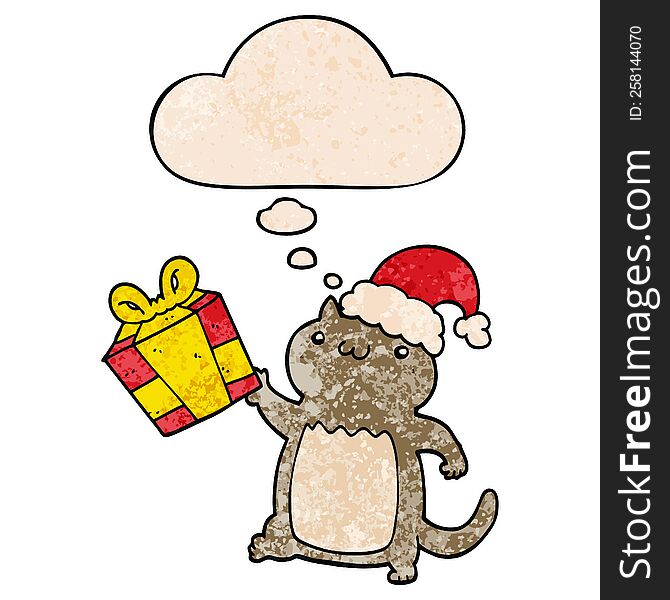 cute cartoon christmas cat with thought bubble in grunge texture style. cute cartoon christmas cat with thought bubble in grunge texture style