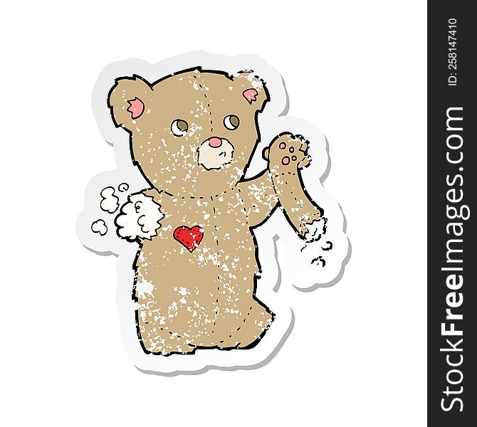 Retro Distressed Sticker Of A Cartoon Teddy Bear With Torn Arm