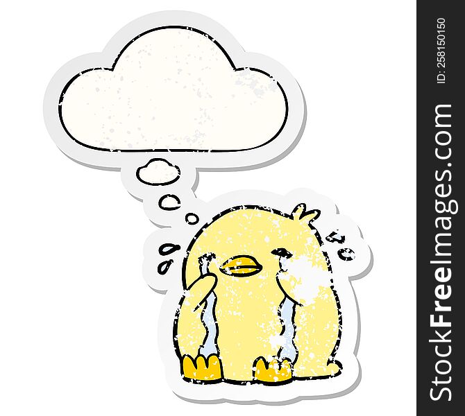 cartoon crying bird with thought bubble as a distressed worn sticker
