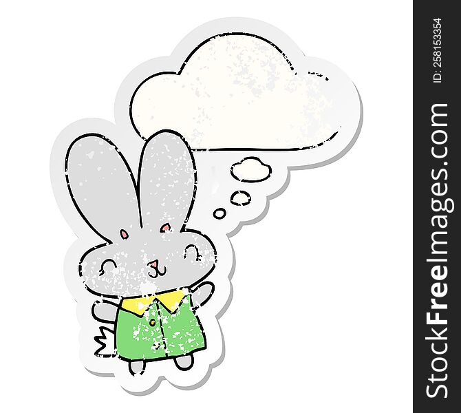 cute cartoon tiny rabbit with thought bubble as a distressed worn sticker