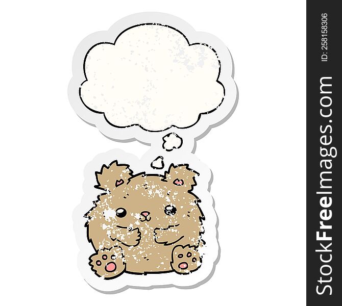 cute cartoon bear with thought bubble as a distressed worn sticker