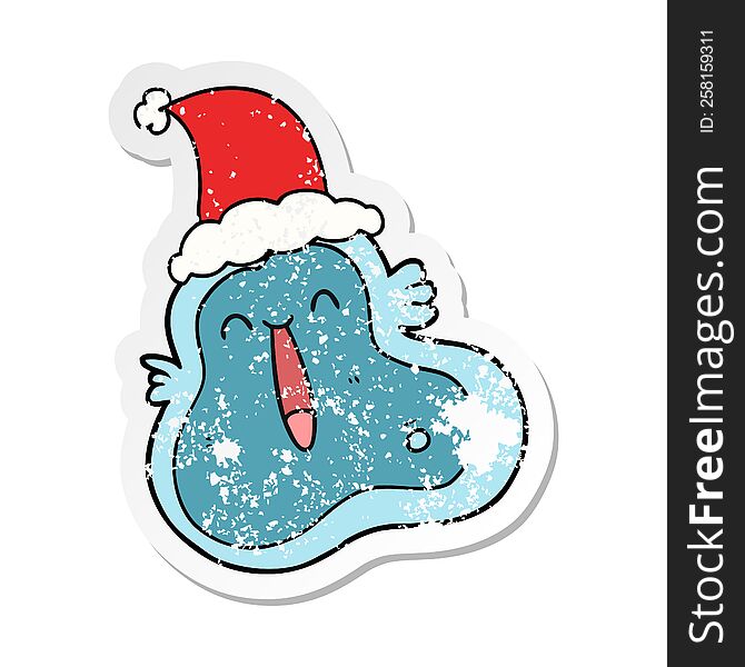 Distressed Sticker Cartoon Of A Germ Wearing Santa Hat