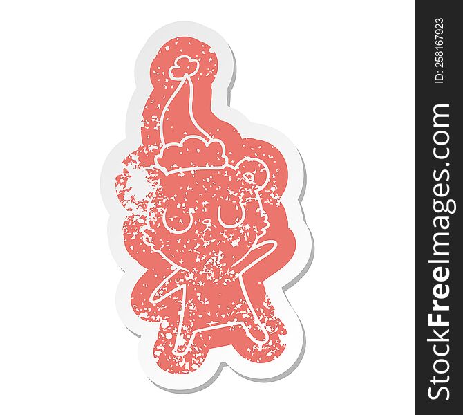 Peaceful Cartoon Distressed Sticker Of A Bear Wearing Santa Hat