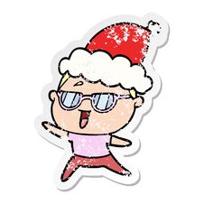 Distressed Sticker Cartoon Of A Happy Woman Wearing Spectacles Wearing Santa Hat Stock Image