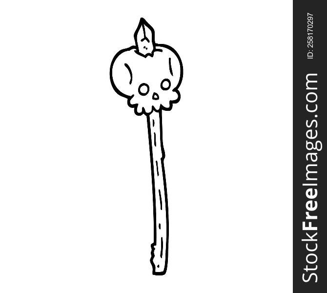 black and white cartoon skull on spike