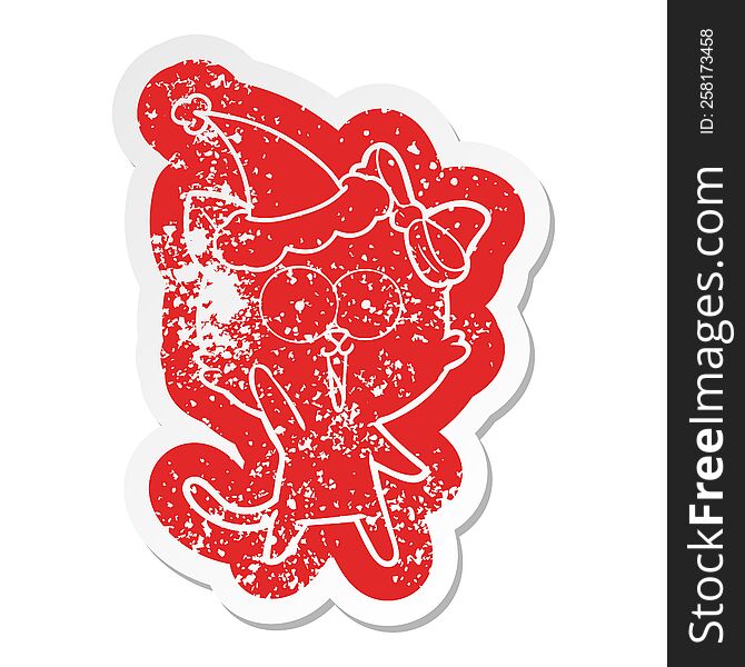 Cartoon Distressed Sticker Of A Cat Wearing Santa Hat