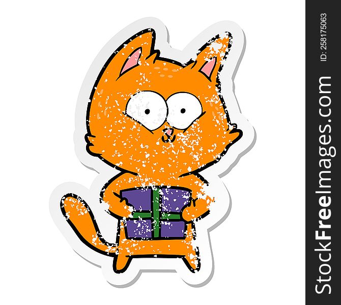 distressed sticker of a cartoon cat holding christmas present