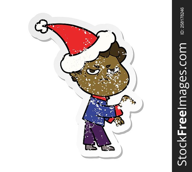 Distressed Sticker Cartoon Of A Angry Man Wearing Santa Hat