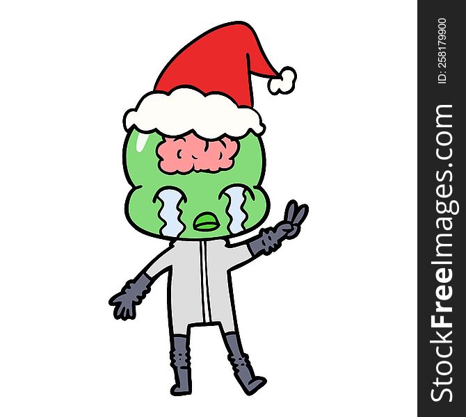 line drawing of a big brain alien crying and giving peace sign wearing santa hat