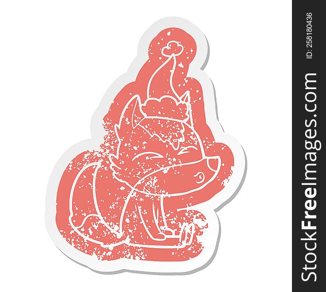 Cartoon Distressed Sticker Of A Wolf Whistling Wearing Santa Hat